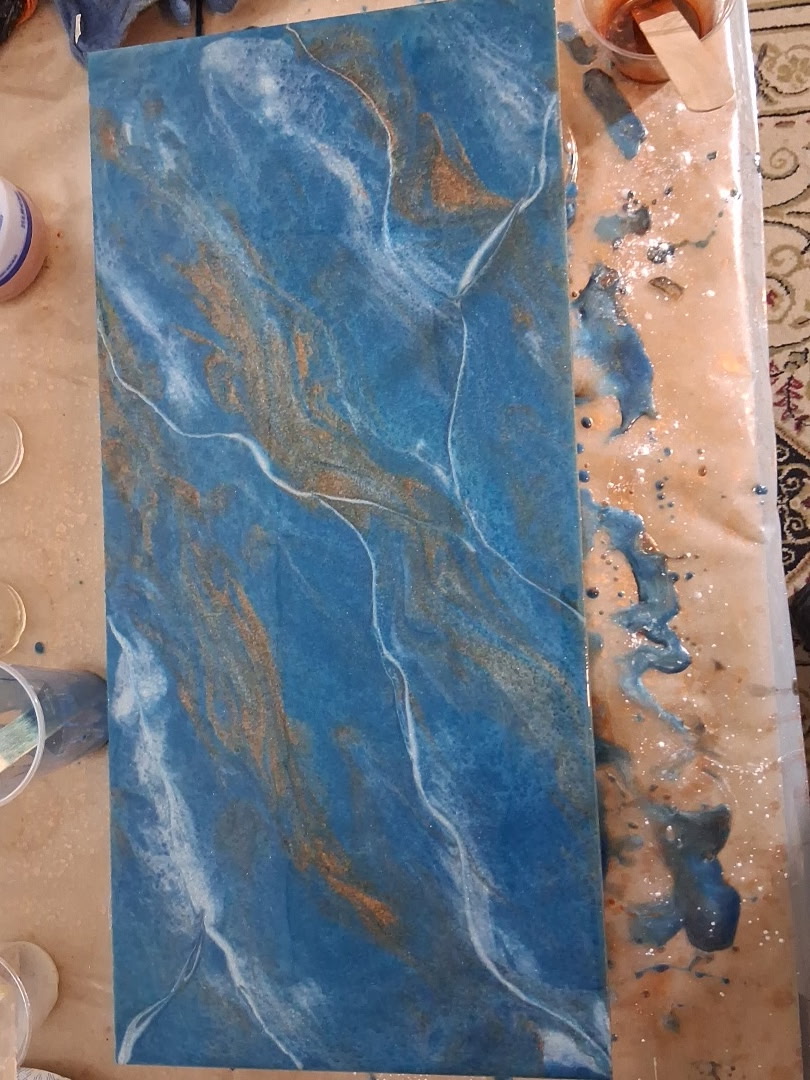 Blue and gold marble-design epoxy sample panel poured by hand
